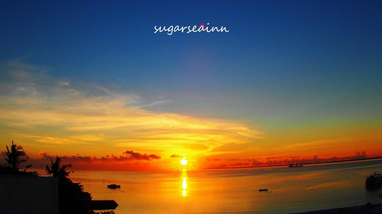 Sugarsea Inn & Dive Shop Мактан Екстер'єр фото