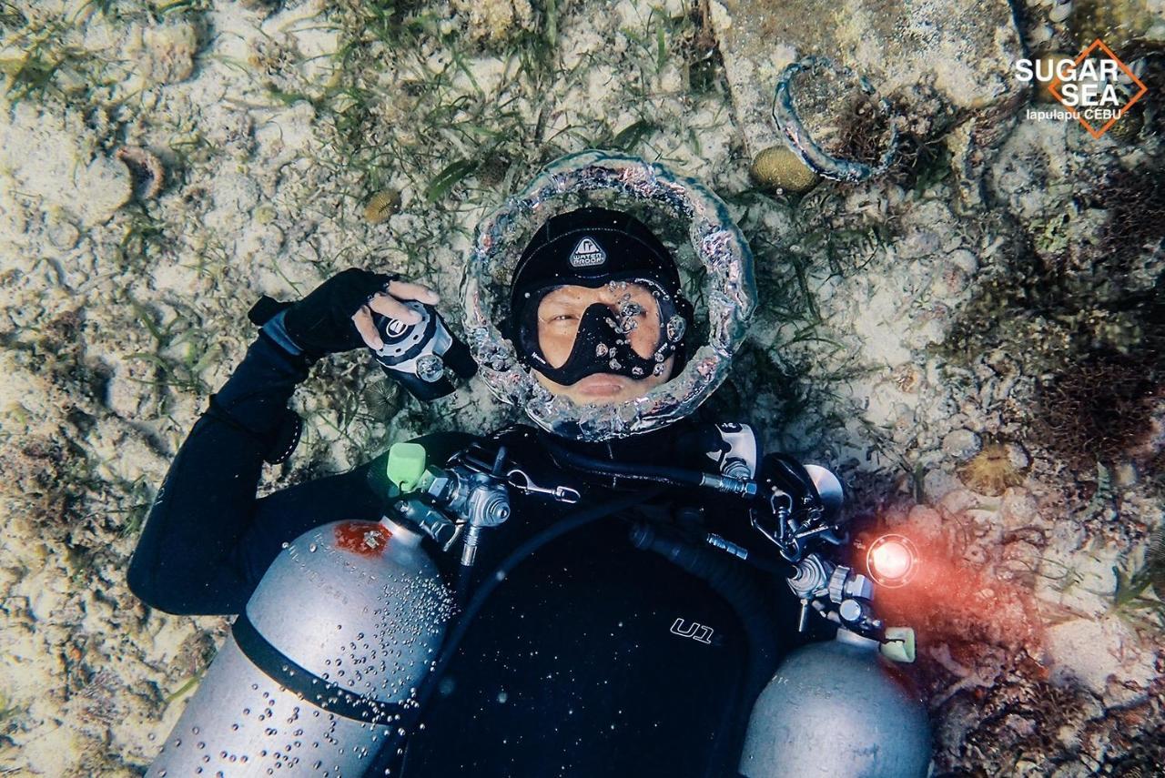 Sugarsea Inn & Dive Shop Мактан Екстер'єр фото